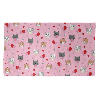 Tapis rose/rouge/beige fait main
