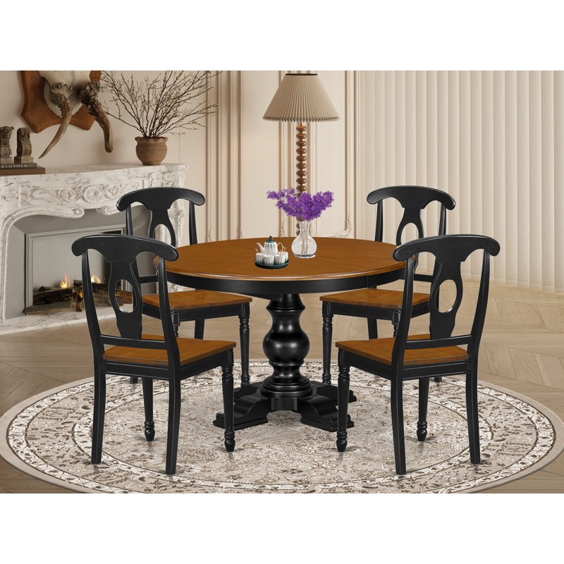 L'ensemble de table de cuisine 5 pièces se compose d'une table de salle à manger avec rallonge et pieds piédestal, 4 chaises en bois, facile à assembler, dossier Napoléon, finition noire