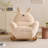 Eggshell arc-shaped streamlined rocking chair
