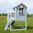 Backyard Discovery Beacon Heights Cedar Wooden Elevated Kids Playhouse with Wave Slide, Play Kitchen, and Deck