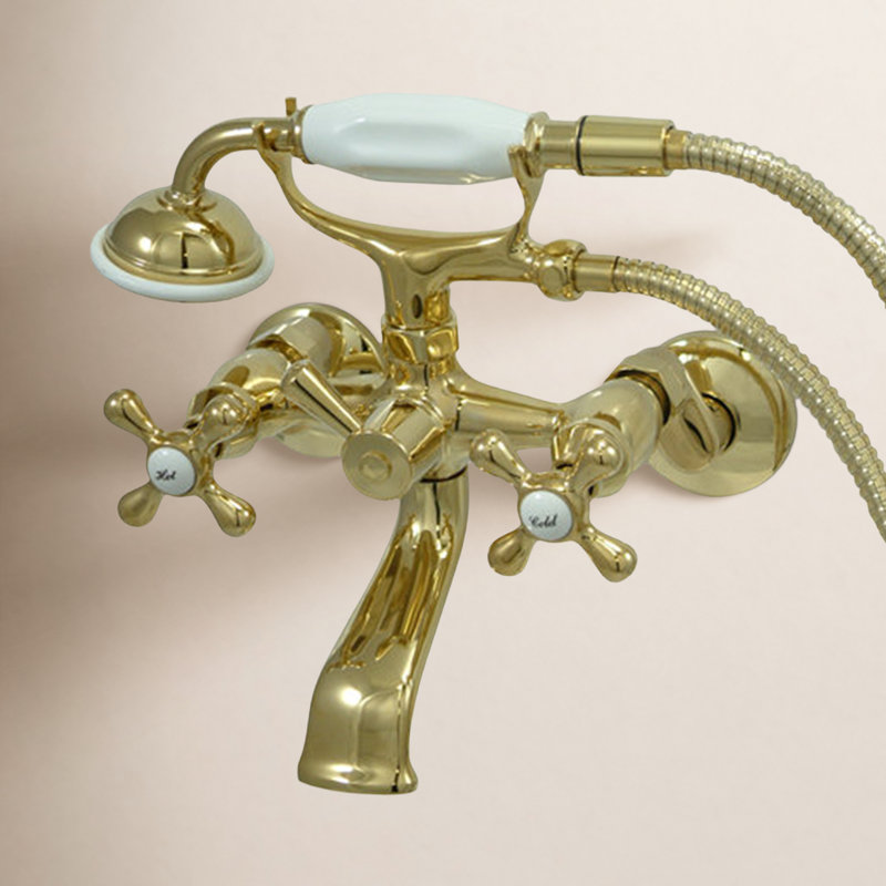 Robinet de baignoire sur pattes à deux poignées et à deux trous avec pomme de douche à main Kingston Brass, Laiton poli