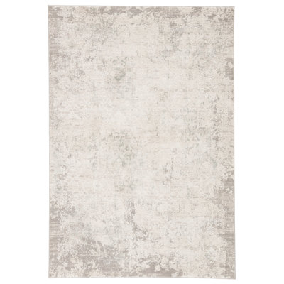 Tapis ivoire à motif damas journaux