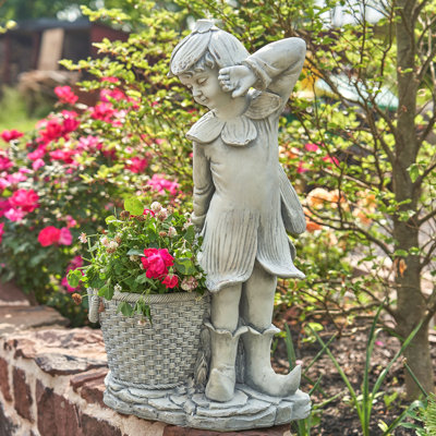Statue de jardin féerique en magnésium avec panier