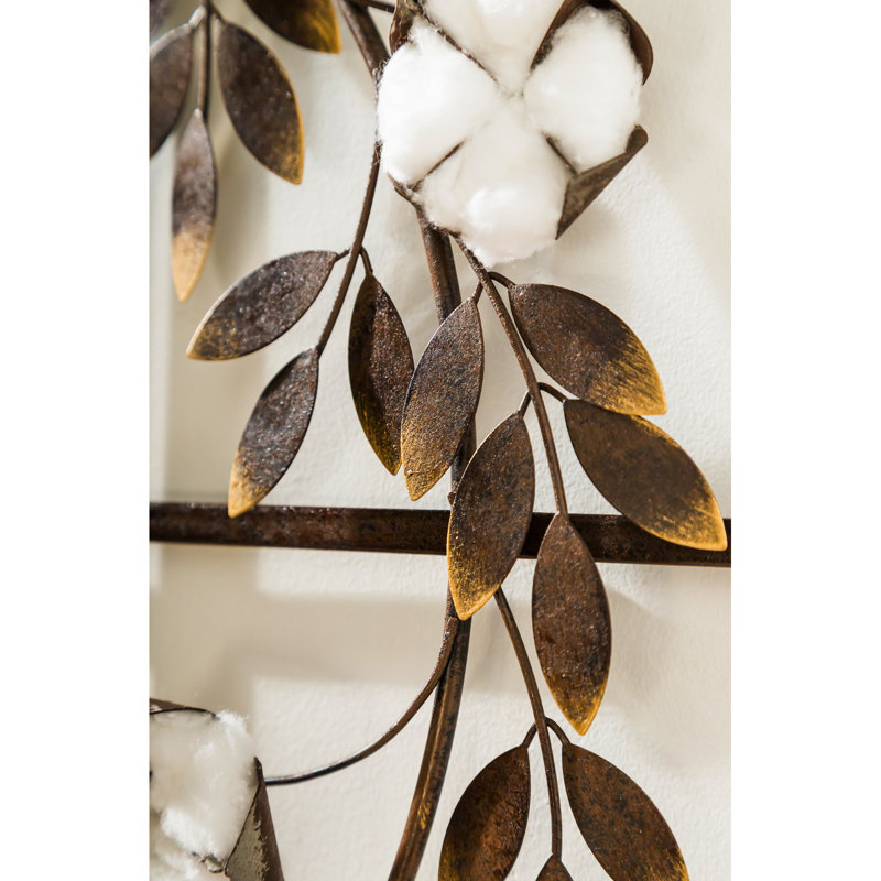 Metal Faux Wreath On Window Frame