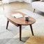 Ensemble de table de salle à manger en osier toutes saisons avec plateau en bois et coussin
