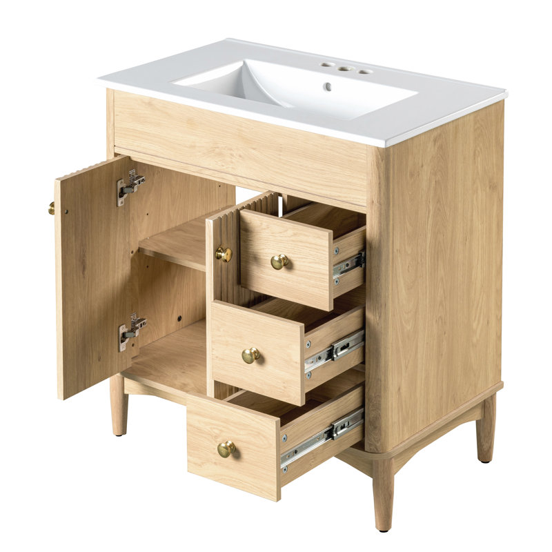 Meuble-lavabo en bois de 76 cm (30 po) avec comptoir en bois blanc, tablette réglable, tiroirs et portes à fermeture amortie.