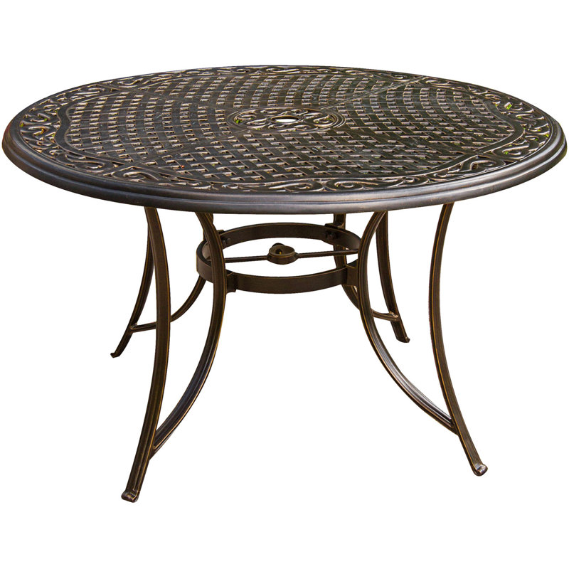 Carleton 4 - Person Patio Dining Set with Round Table , Cushions Included, Black/Blue