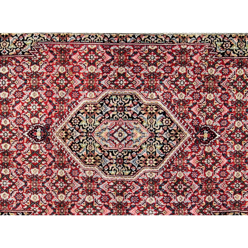 Tapis rouge noué à la main de haute qualité