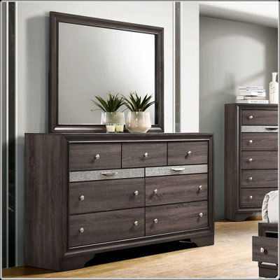 Commode noire élégante avec miroir assorti, tiroir à bijoux caché et décorations argentées pour les chambres modernes