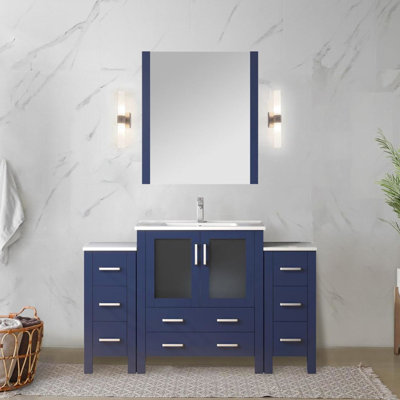 Meuble-lavabo bleu marine de 137 cm de large, armoires latérales, miroir de 71 cm, tiroirs à fermeture douce, dessus en céramique, armoire intérieure de rangement, meuble-lavabo large résistant aux égratignures et aux taches avec mécanisme blanc.
