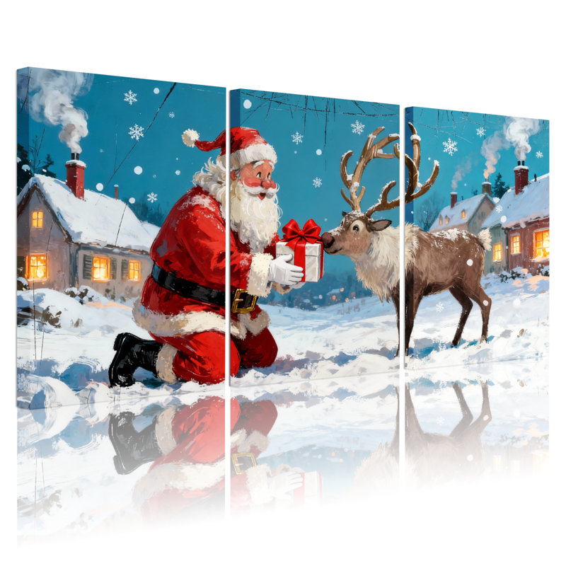 Ensemble de 3 impressions sur toile, père Noël agenouillé avec renne dans un village enneigé, H 18 po x l 36 po
