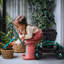 Chariot de jardin roulant vert avec dossier et siège rembourrés