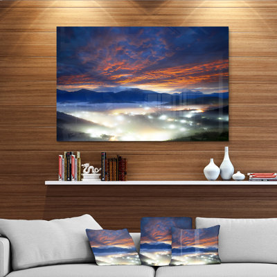 Fiery Clouds and Lit up Villages - Photographie sans cadre sur métal