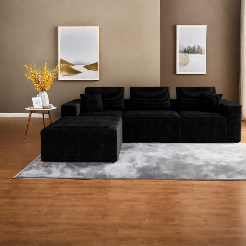 Canapé modulaire moderne noir, velours côtelé moelleux, conception de salon spacieuse