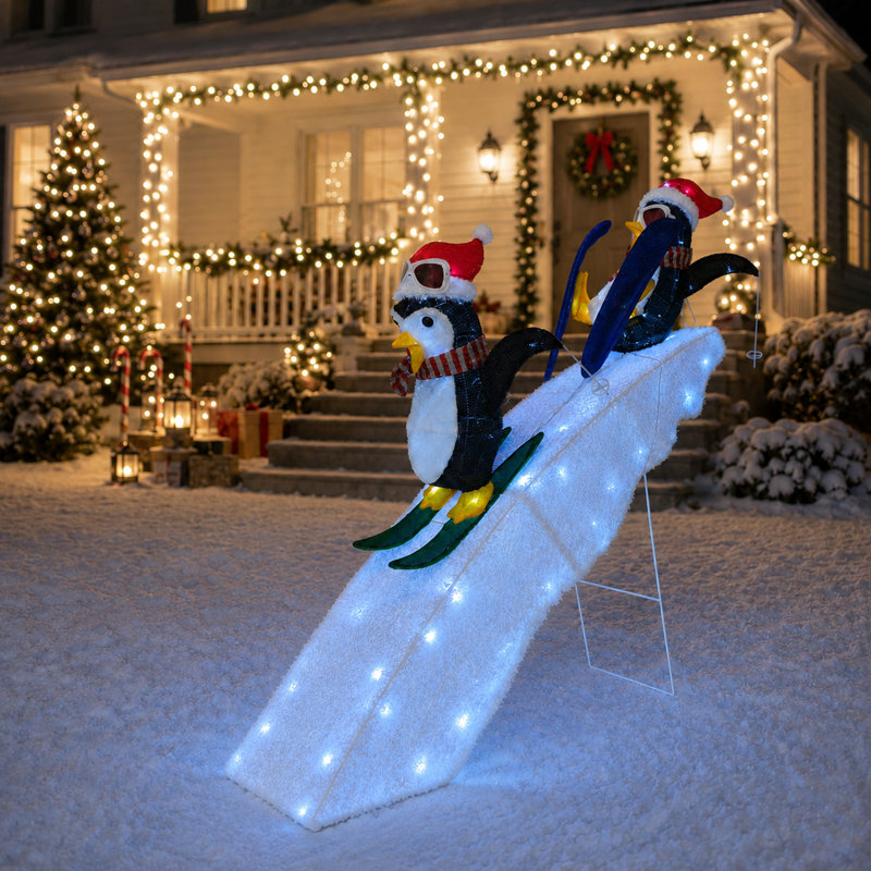 Duo de pingouins skieurs joueurs de 1,20 m sur une piste enneigée - Décoration lumineuse de Noël pour jardin