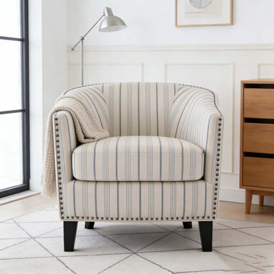 Fauteuil demi-tonneau rembourré à rayures