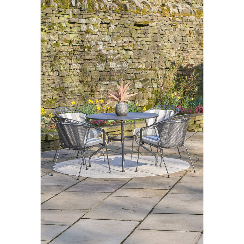 4 - Person Patio Dining Set with Round Table , Cushions Included