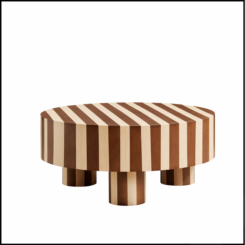 Table basse ronde en bois au fini naturel, idéale pour un salon à la fois élégant et fonctionnel.