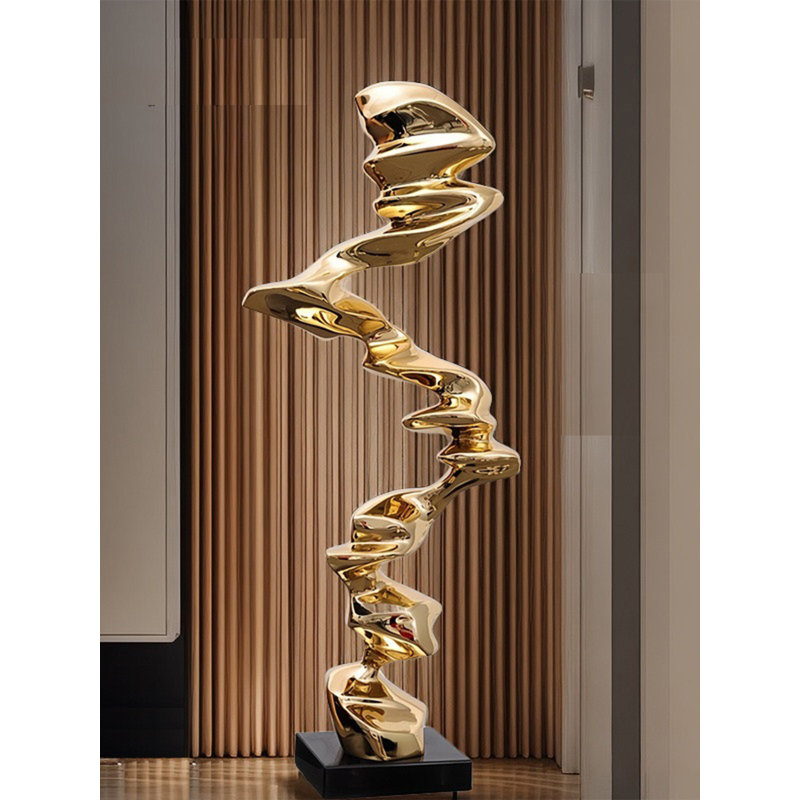Sculpture moderne au sol torsadée en résine abstraite