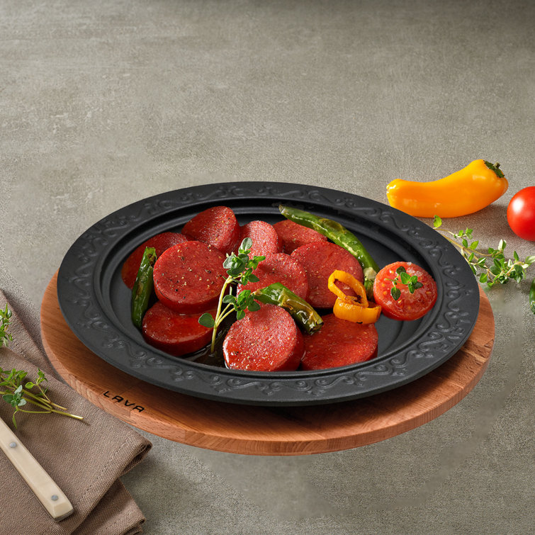 https://assets.wfcdn.com/im/55438068/resize-h755-w755%5Ecompr-r85/2091/209138105/Lava+Enameled+Cast+Iron+Serving+Dish+11+inch-Round+with+Beechwood+Service+Platter.jpg