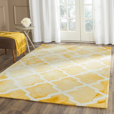 Tapis jaune / ivoire en laine touffeté fabriqué à la main à motif géométrique