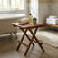 Petite table pliante en teck, finition huilée