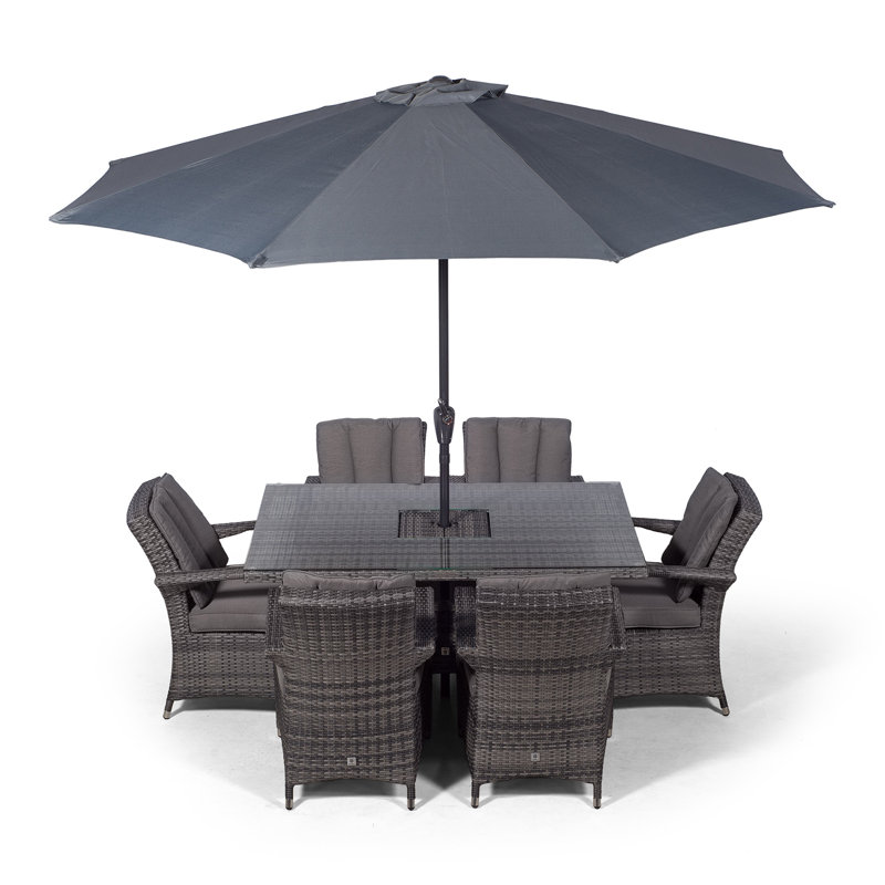 Karas 6 - Person Wicker Patio Dining Set with Rectangular Table , Cushions Included, Grey