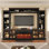 Meuble télé 98 po avec foyer électrique, grand centre de divertissement pour téléviseurs de 70 po, console de télévision avec station de charge, trous pour câbles, tablettes réglables et portes en verre