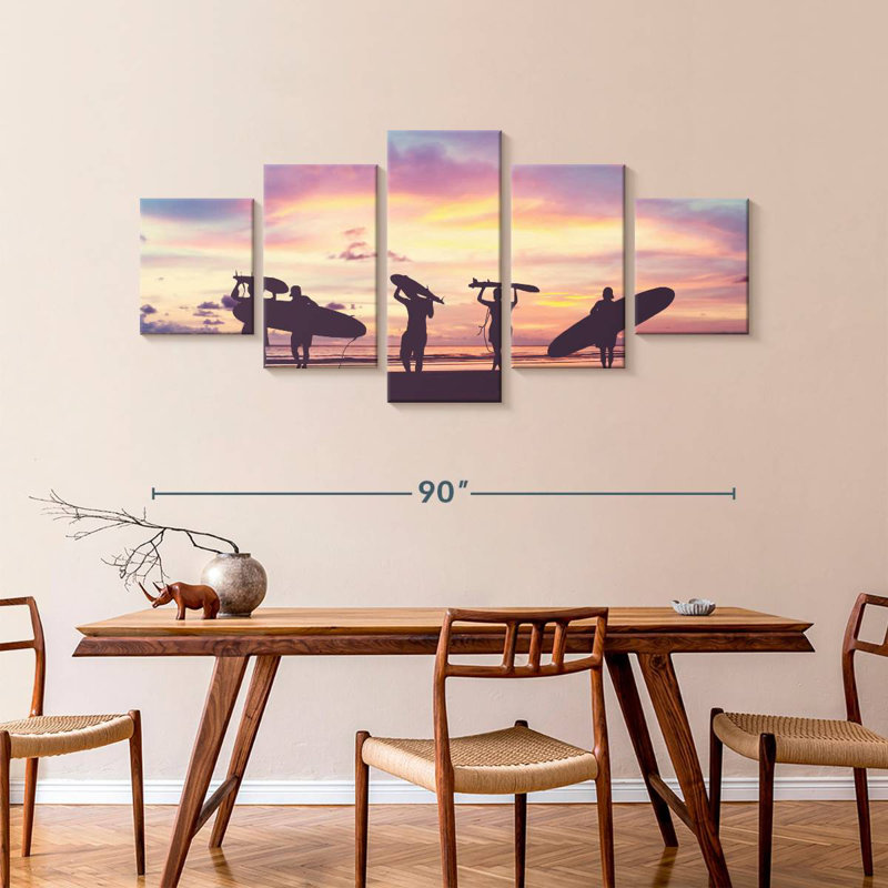 Silhouette de surfeurs