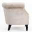 Fauteuil club en velours avec boutons