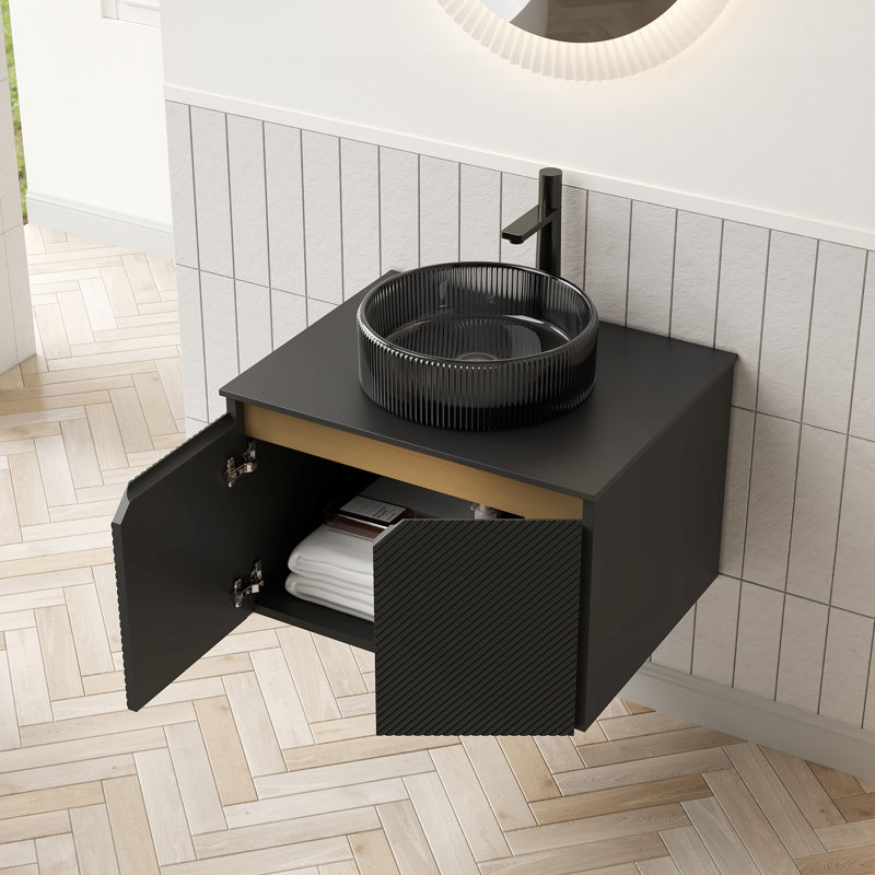 Meuble-lavabo de 61 cm (24 po) avec lavabo rond transparent noir, comptoir en pierre frittée, design symétrique en sergé, mécanisme de fermeture amortie, structure en contreplaqué et bois massif.