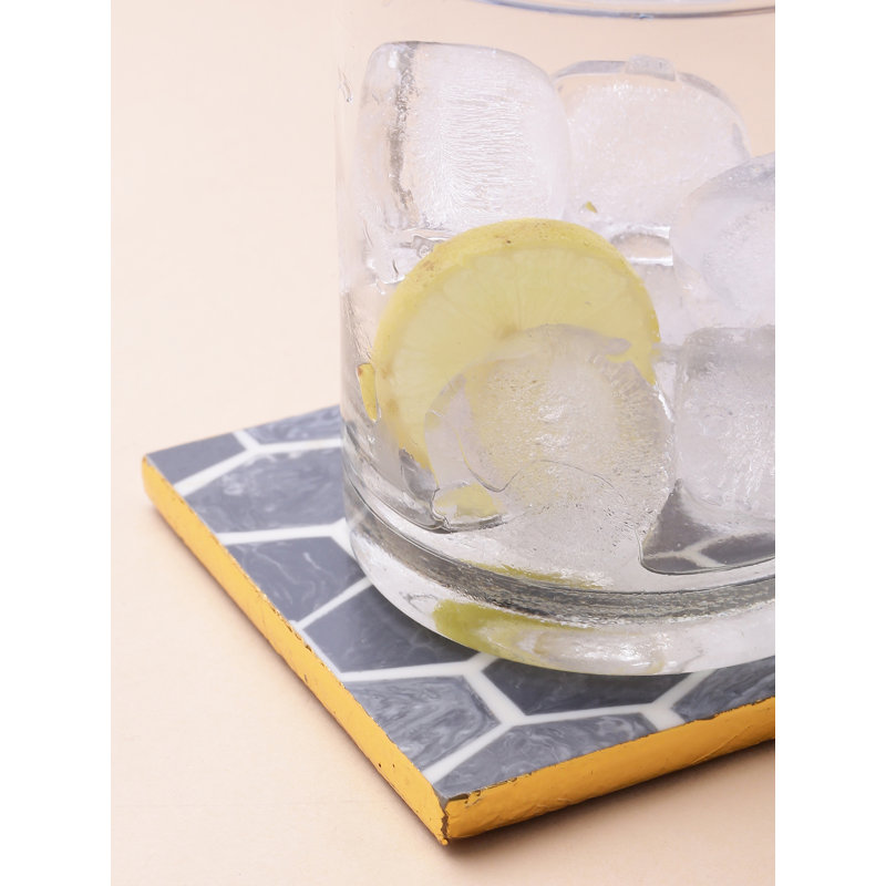 Ensemble de 4 sous-verres en résine grise