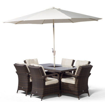Karas 6 - Person Patio Dining Set Umbrella Hole Included Rectangular Table with Cushions Included