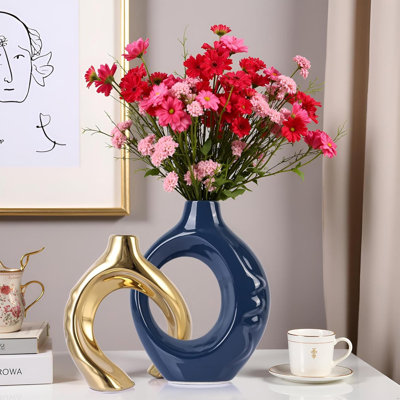 Vases en céramique bleus et dorés