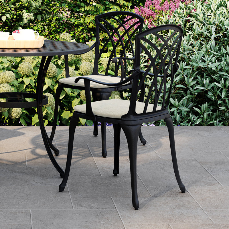 4 - Person Patio Dining Set with Round Table , Cushions Included