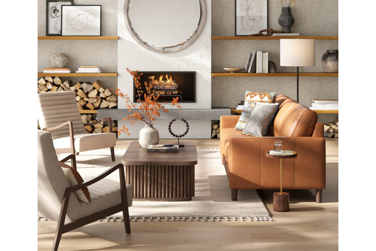Neutral toned living room with tan leather sofa, wood coffee table, fireplace