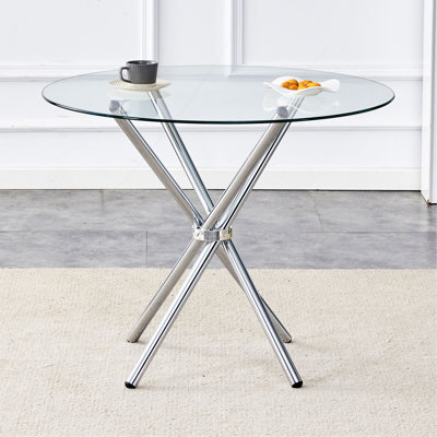 Table de salle à manger ronde en verre transparent avec une forme unique pour 4 à 6 personnes, avec des pieds en métal argenté en forme d'anneau, convenant aux bureaux, aux cuisines, aux terrasses et aux salles à manger.