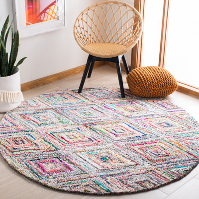 Tapis bleu / rose / jaune touffeté à la main à motif géométrique Anaheim