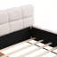 Grand lit tapissier en chenille beige de grande taille avec motif en damier, doux et durable