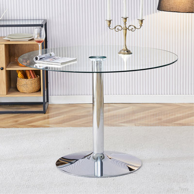 Un plateau de table en verre d'un diamètre de 39,7 pouces et une table de salle à manger circulaire minimaliste moderne avec des pieds en métal argenté électrolytique. Convient aux restaurants et aux salons. W1151S01504