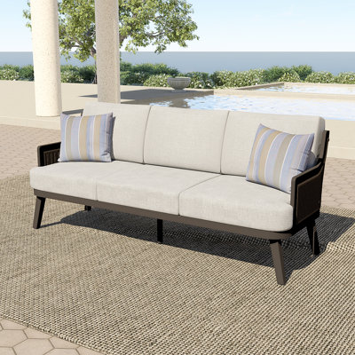 Ludovic Metal & Polyester Patio Sofa With 2 Accent Pillows, Brown by George Oliver