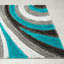 Tapis turquoise à motif géométrique Koo-1394437170