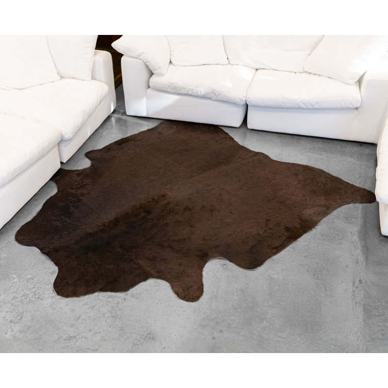 Tapis brun en cuir de vache fabriqué à la main