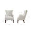 Fauteuil à oreilles capitonné Hannah