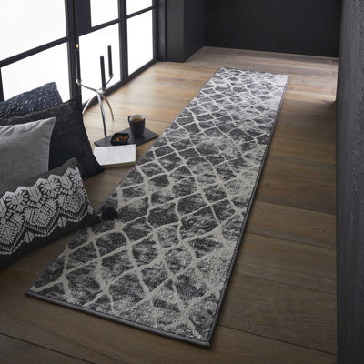 Posey Geometric Area Rug