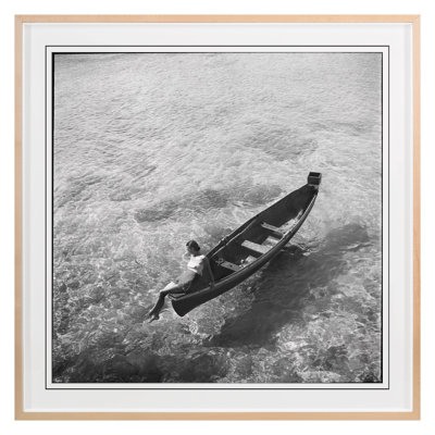 Woman On Boat Print by Grand Archives