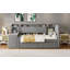 Lit de jour simple tapissier avec tiroirs, tablettes, armoires rabattables et table d'appoint