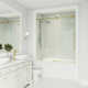 Elan E-Class 56-60" W x 66" H Sliding Frameless Tub Door with 3/8" Clear Glass