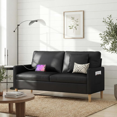 65" Black Faux Leather Sofa