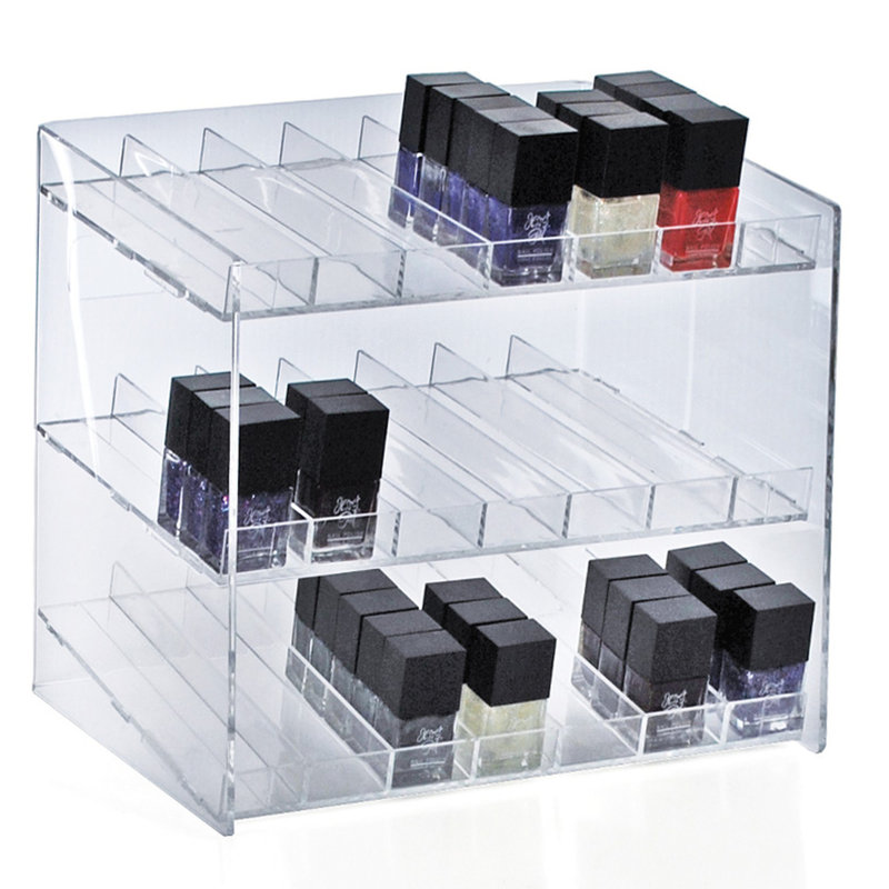 Présentoir à trois niveaux et 21 compartiments (7 compartiments par niveau). Dimensions : 30,5 cm (L) x 21,5 cm (P) x 26,5 cm (H).